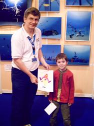Pascal Lecocq with young contestant at the Paris Dive show 2007, with publishing parents authorization