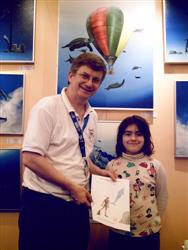 Pascal Lecocq with young contestant at the Paris Dive show 2007, with publishing parents authorization
